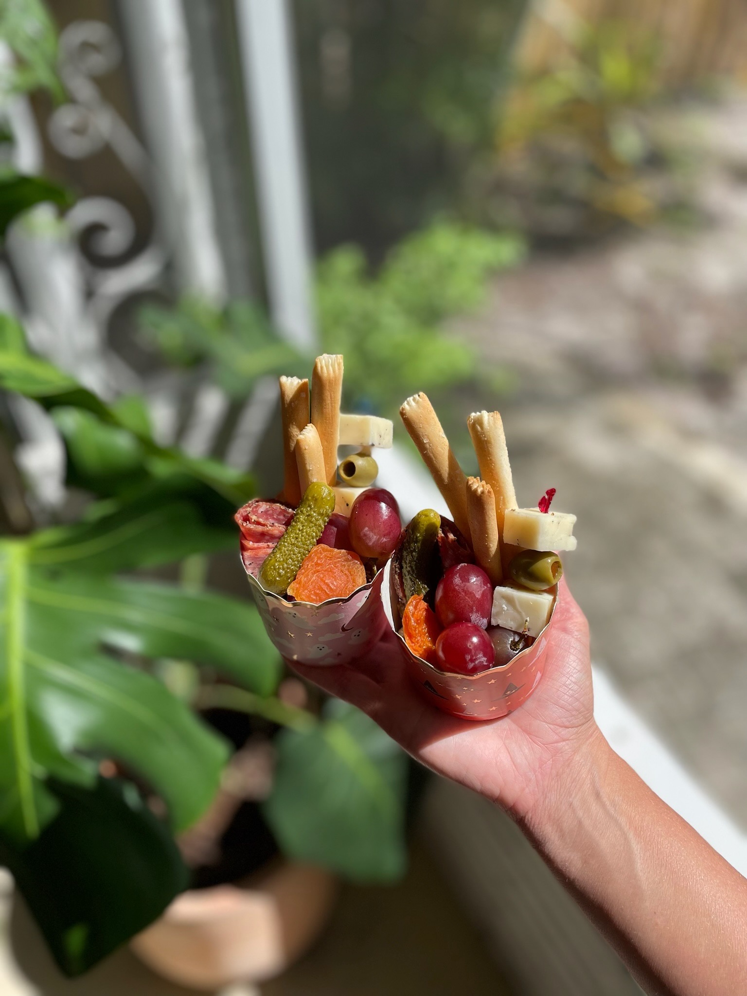 Sunny Graze Co. fruit, cheese, and charcuterie arrangement