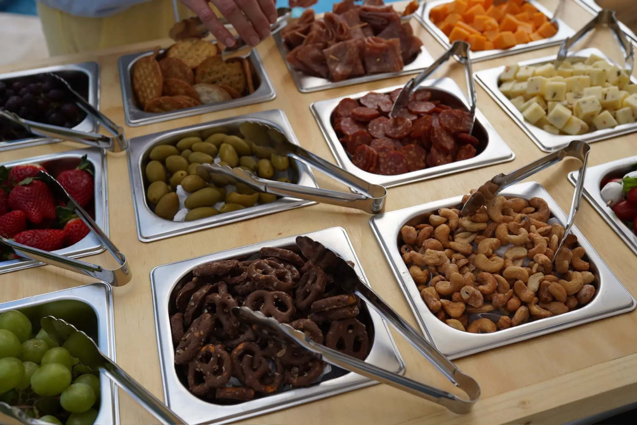 Elegant grazing table displayed at a wedding reception